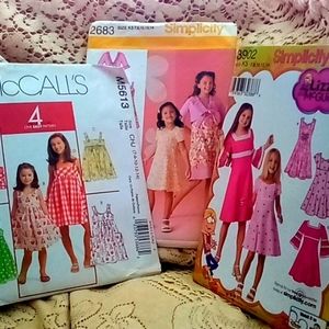 3 uncut Simplicity and a new McCall's girls dress patterns